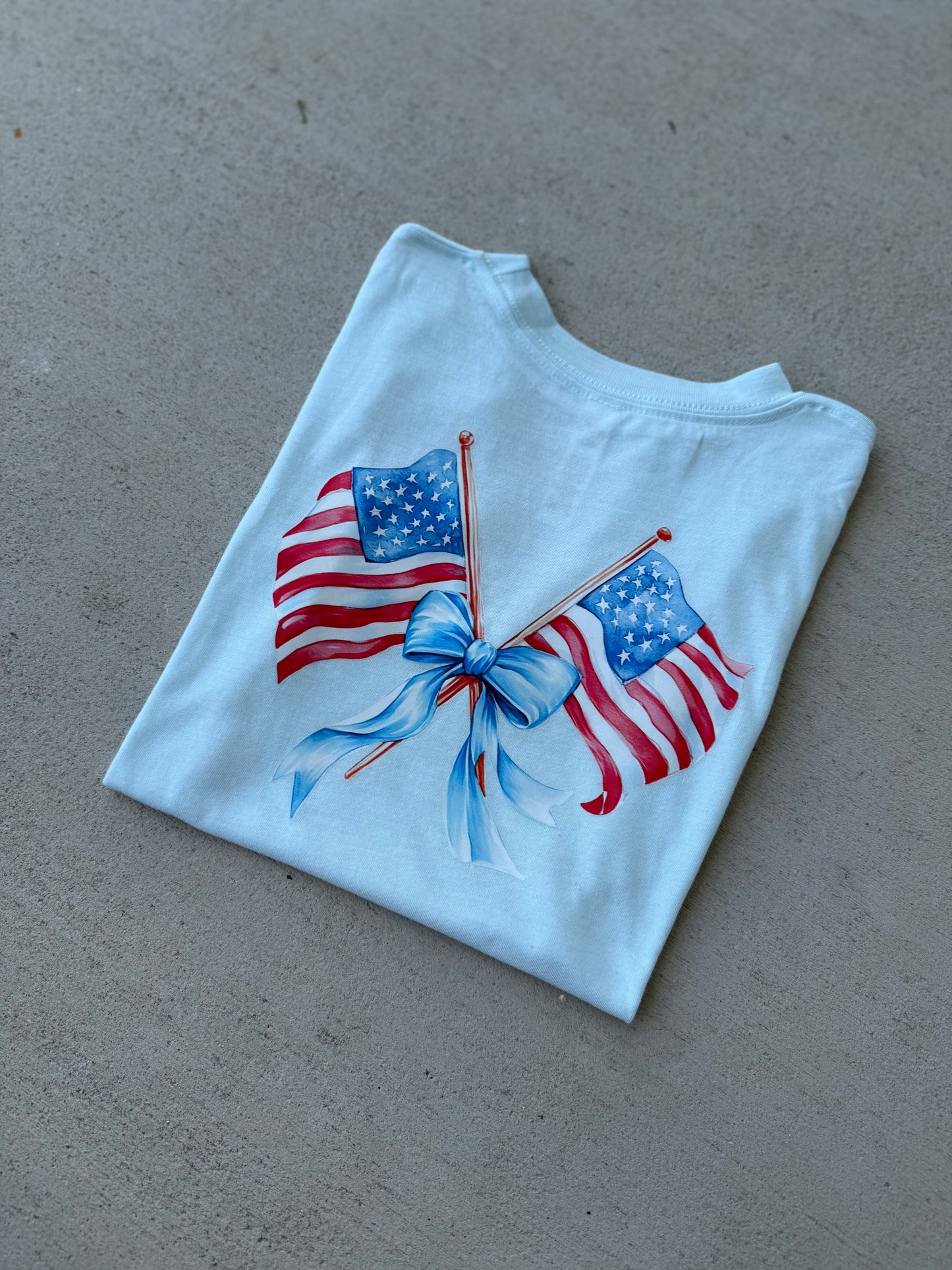 Two flags with Blue Bow